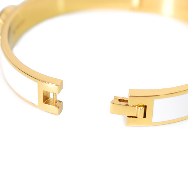 画像: 【COACH】コーチ バングル ゴールドプレーテッドブラス シグネチャー ヒンジド バングル ブレスレット ゴールド×チャーク 〔日本未発売〕